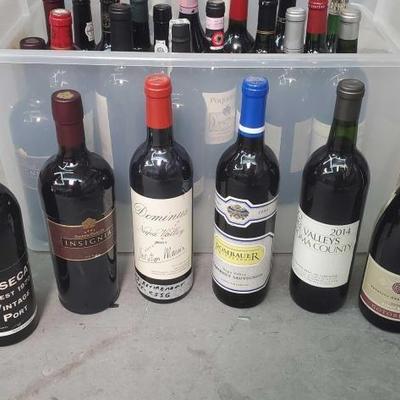 #1030 â€¢ Collection of Sealed Bottles
