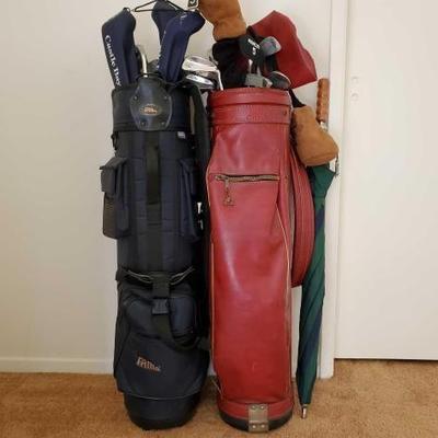 #12634 â€¢ 2 Golf Bags, Taylor Made, Cougar Golf Clubs
