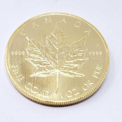 #144 â€¢ 1 Oz Canadian Maple Leaf .9999 Gold Coin
