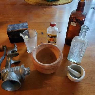 #8604 â€¢ Mortar and Pestle, Vintage Meat Grinder, Vintage Bottles and More

