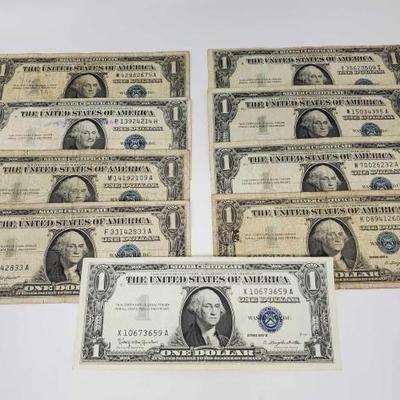 #338 â€¢ 9 Blue Sealed Dollar Bills
