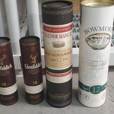 #1060 â€¢ Collection of Sealed Bottles In Cases
