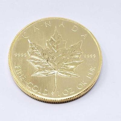 #136 â€¢ 1 Oz Canadian Maple Leaf .9999 Gold Coin
