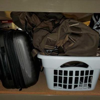 #10526 â€¢ Storage Bags and Suitcase
