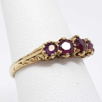 #675 • 14k Gold Ring With Rubies, 2.1g