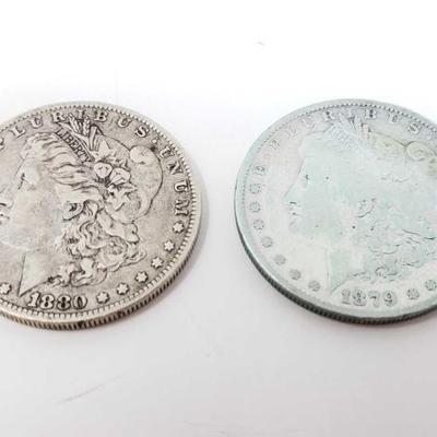 #216 â€¢ 1880-O And 1879 Morgan Silver Dollars

