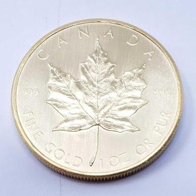 #128 â€¢ 1 Oz Canadian Maple Leaf .9999 Gold Coin
