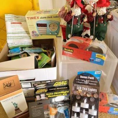 #9538 • Santa Figurines, Kitchen Towels, Large Rubber bands, Binders and More