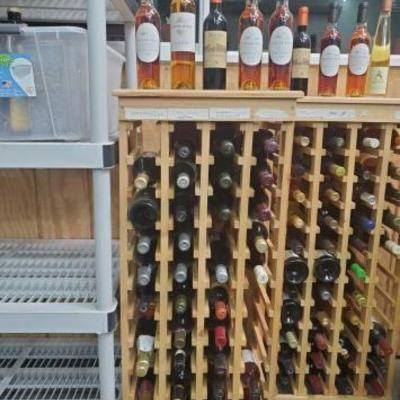 #1070 â€¢ Collection of Sealed Bottles on Rack
