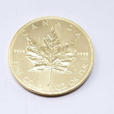 #140 â€¢ 1 Oz Canadian Maple Leaf .9999 Gold Coin
