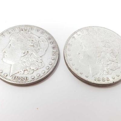 #176 • 2 1886 Morgan Silver Dollars
