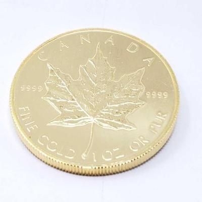 #154 â€¢ 1 Oz Canadian Maple Leaf .9999 Gold Coin
