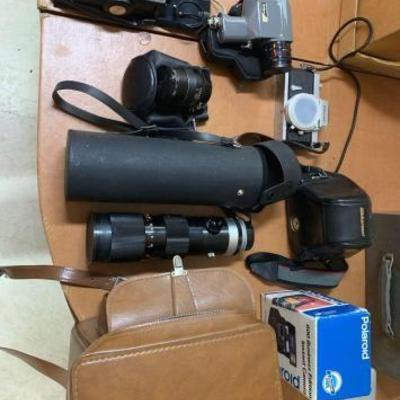 #10594 â€¢ Polaroid and Nikkromat Cameraâ€™s, Soligor Camera, Lens, and Flash
