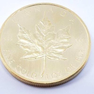 #130 â€¢ 1 Oz Canadian Maple Leaf .9999 Gold Coin
