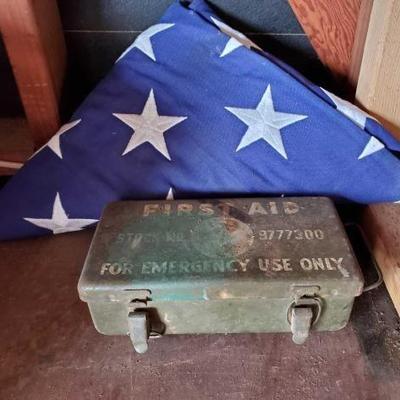 #2422 â€¢ Folded Flag and US Army First Aid Kit
