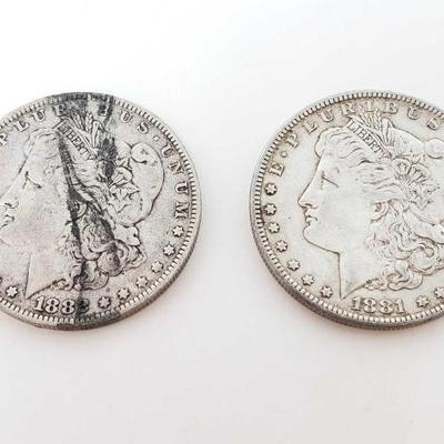 #204 â€¢ 1882-O And 1881 Morgan Silver Dollars

