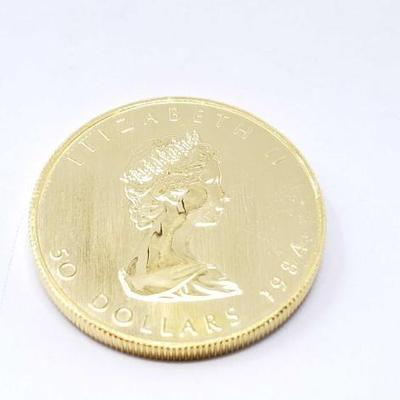 #146 â€¢ 1 Oz Canadian Maple Leaf .9999 Gold Coin
