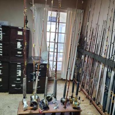 #2318 â€¢ 11 Fishing Poles with 7 Reels
