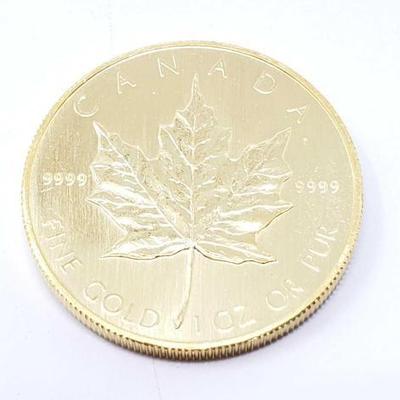 #118 â€¢ 1 Oz Canadian Maple Leaf .9999 Gold Coin
