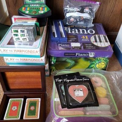 #12650 • Playing Cards, Chalk, Picture Frames, How to Play Piano. 4 Harmonica Sets, Virtual Casino, and More