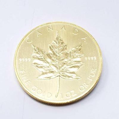 #124 â€¢ 1 Oz Canadian Maple Leaf .9999 Gold Coin

