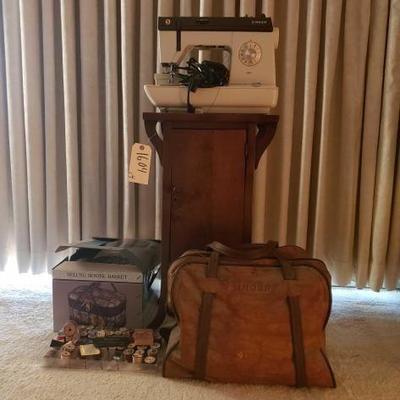#2260 â€¢ Sewing Machine and Table, and Supplies
