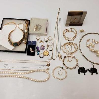 #827 • Costume Jewelry With Clock