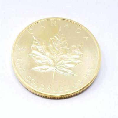 #158 â€¢ 1 Oz Canadian Maple Leaf .9999 Gold Coin

