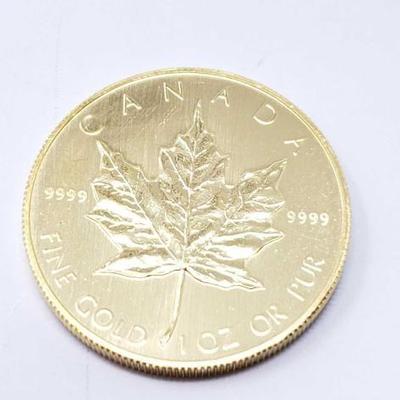#152 â€¢ 1 Oz Canadian Maple Leaf .9999 Gold Coin
