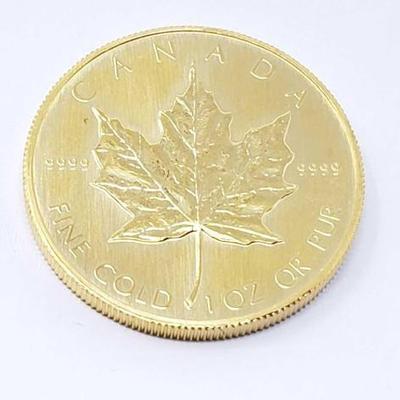 #100 â€¢ 1 Oz Canadian Maple Leaf .9999 1984 Gold Coin
