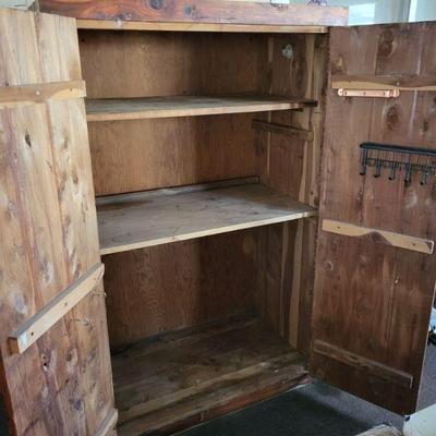 Large cedar cabinet open