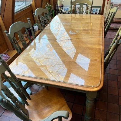 Dining room table and chairs   NOTE: cover glass is cracked, table is fine.