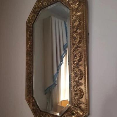 Brass-framed mirror