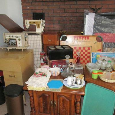 sewing machines with cabinets, glass flasks; dishes, large shadow box; trays; picture box