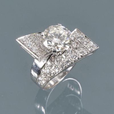 2.90CT ROUND BRILLIANT DIAMOND RING | Having a central 2.90-carat diamond [9.2 - 9.45 x 5.46 mm] prong set into a white gold screw...