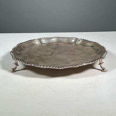 STERLING SILVER SALVER | Gadrooned edge decoration, raised on 3 feet, marked 
