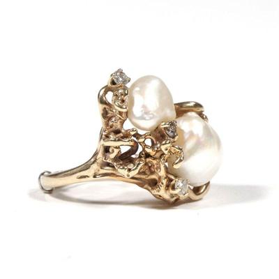 BAROQUE PEARL & DIAMOND RING | Having two white baroque pearls (11.2 mm large) set in an organic ocean-reef form 14k gold surround...