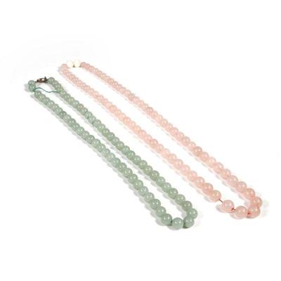 (2pc) CHINESE JADE BEADED NECKLACES | Including a pale green jade beaded necklace with a cloisonne clasp and a pink jade or rose quartz...