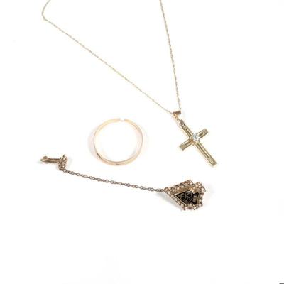 (3pc) MISC GOLD ITEMS | including a 14k gold cross mounted with a diamond on a fine link chain; a worn down 14k gold ring (together...