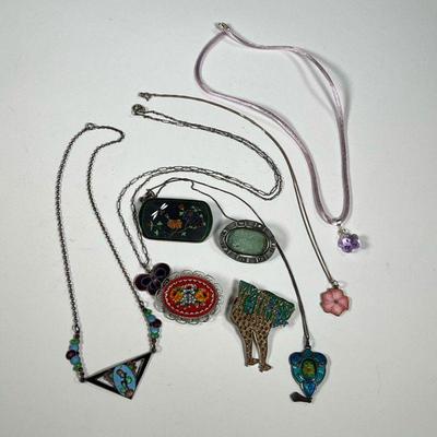 ENAMELED STERLING JEWELRY | Including a sterling and ancient Roman glass pin and a micromosaic pin; plus enameled silver jewelry,...