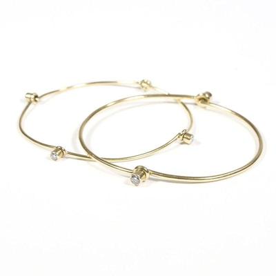 (2pc) DIAMOND & GOLD WIREWORK BRACELETS | One with two articulating hinges (folds in half) mounting two diamonds, the other with four...