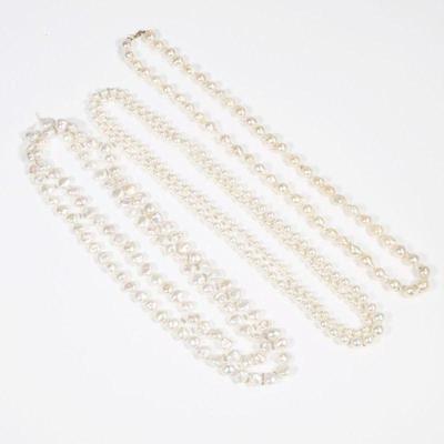 (3pc) WHITE PEARL NECKLACES | Including a knotted strand of baroque pearls (10mm, 39 in.); a graduated continuous knotted pearl necklace...