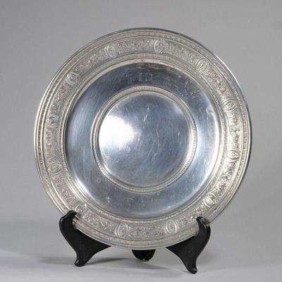 WEDGWOOD ETRUSCAN STERLING SILVER PLATE | with a chased engraved border. 10.6 ozt, dia. 10 in.
