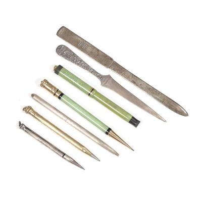 (7pc) DESK ITEMS | Including two Bakelite and gold Parker pens (one Lucky Curve), a Wahl gold-filled pencil, a Tiffany & Co. sterling...