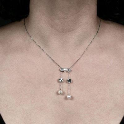 J.E. CALDWELL NATURAL PEARL & DIAMOND NECKLACE | Designed as central plaque mounting a natural button pearl flanked by six .20 ct...