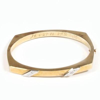 SPANISH 14K GOLD HINGED HARD BRACELET | having two platinum plaques mounted with melee diamonds engraved 