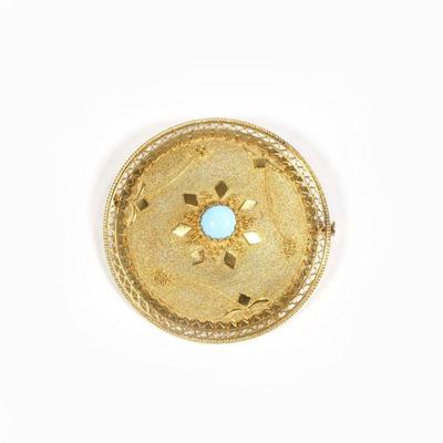 18K GOLD & TURQUOISE BROOCH | Round pin having a central round evenly colored turquoise cabochon in a textured 18k gold dome surround...