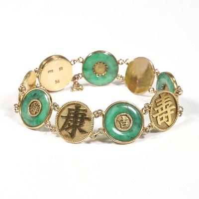 JADE & 18K GOLD CHINESE BRACELET | With alternating links of gold Chinese characters and gold mounted bi discs, marked 