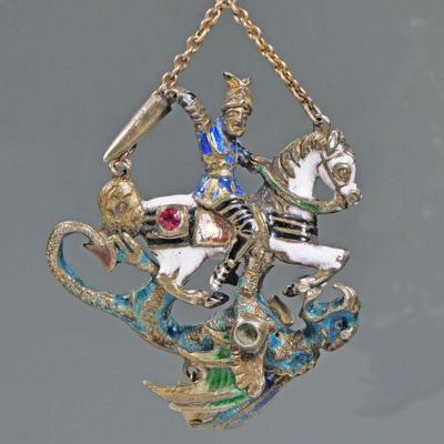 ENAMEL DECORATED ARTICULATING KNIGHT & DRAGON PENDANT | Designed as guilloche enameled knight on horseback (possibly St. George) wearing...