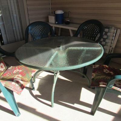 Glass top patio table